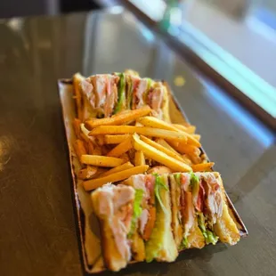 Turkey club- House roasted turkey, lettuce, tomato, crispy bacon, on Texas toast