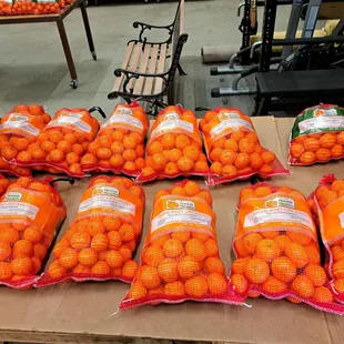 10# or 10 lb bags of mandarin oranges