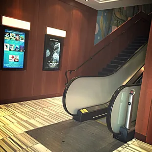 For the convenience of our customers, we offer an escalator and an elevator to our second level theater.