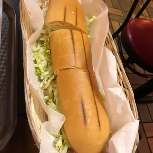 a hot dog in a basket
