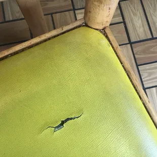 Time to replace some chairs. Look at the crap in the cracks.