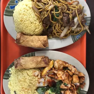 two plates of asian food