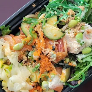 a salad in a plastic container