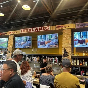 Bar area with large tv screens
