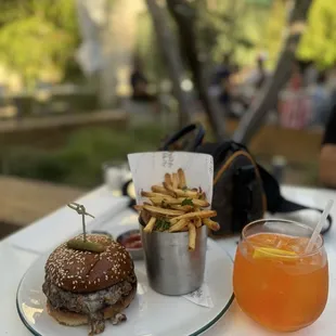 Burger and fries with Aperol Spritz