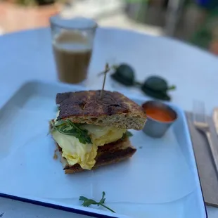Breakfast sandwich. Not sure what it&apos;s called on the menu. Make sure to ask for bacon if you want some, I missed out!