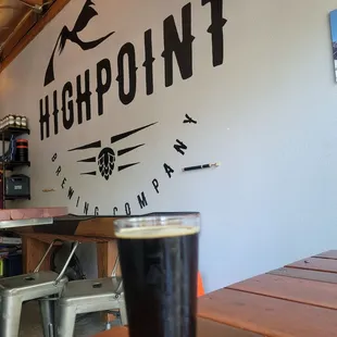 a pint of beer on a table