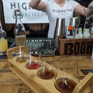 a bartender pouring a drink