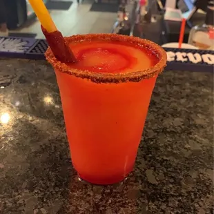 Mangonata.!!  A mango margarita made with vodka. With a  Chamoy and tajin rim.!