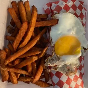 Chicken wrap lunch special. NOT understanding the egg on top on the wrapped up wrap. Lol Sweet potato fries were not cooked all the way.