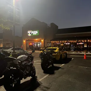 parked motorcycles in a parking lot