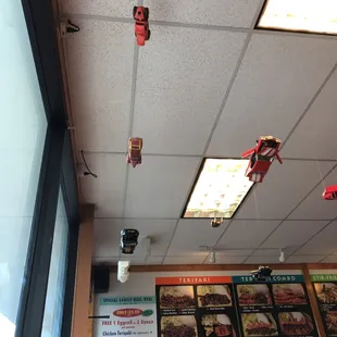 Toy cars hanging from the ceiling