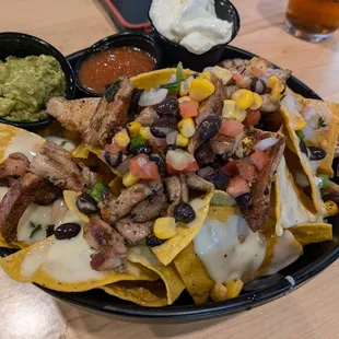 Chicken nachos w/guacamole $11