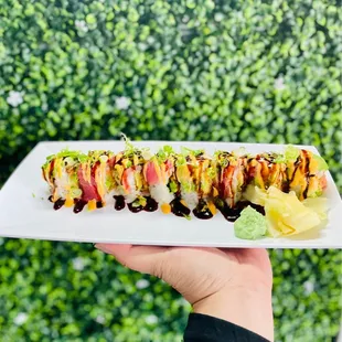 Summer Roll - Spicy Tuna, cucumber, topped with fresh tuna, avocado, spicy mayo and eel sauce