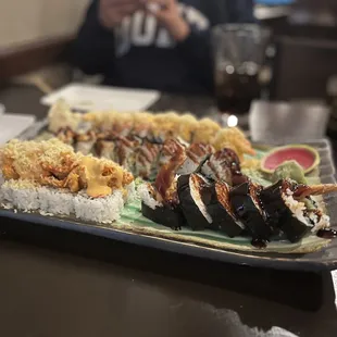 ows a plate of sushi and rice