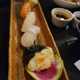 Chopped scallop, scallop, superwhite and salmon nigiri.