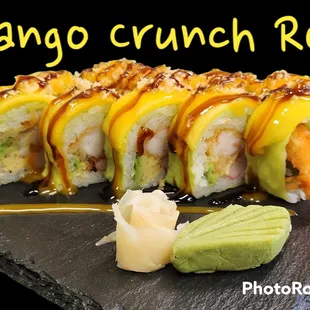 Inside: Shrimp Panko Tempura, Kani and Avocado
Top: Mango Slices, Tempura Flake, Mango Sauce and Eel Sauce