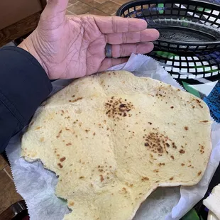 Tortilla bigger than my hand.