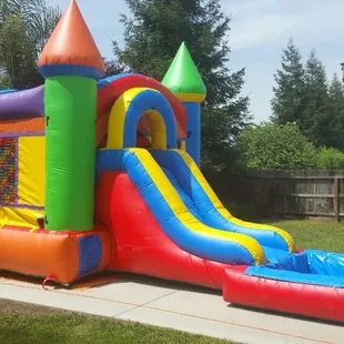 Bounce house with slide and pool combo
