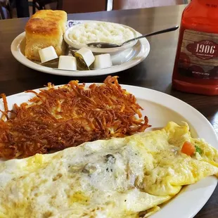 Hill Country omelette....yeehaaaa good....comes with choice of hash browns or grits, toast or biscuit.