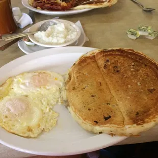 a plate of pancakes and eggs