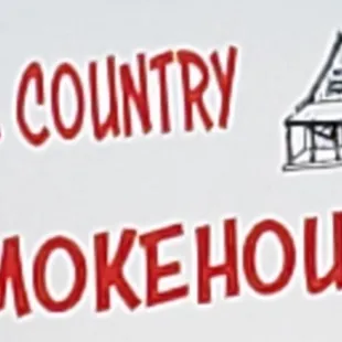 a white sign with red lettering