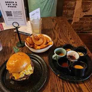The Ok Burger, Curlyish Fries, and sauces. Beefonaise, Kansas City, Georgia Gold, Tomato Relish, Sweet Chili Mayo, and Trademark Sauce.
