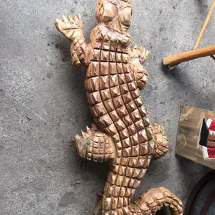 1/17/16. Sunday afternoon drive with no clear agenda leads us here. The coolest place on Planet Earth. Maybe? Chainsaw Carved Gator!