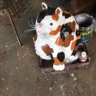 1/17/16. Sunday afternoon drive with no clear agenda leads us here. The coolest place on Planet Earth. Maybe? Chainsaw carved Calico Cat!