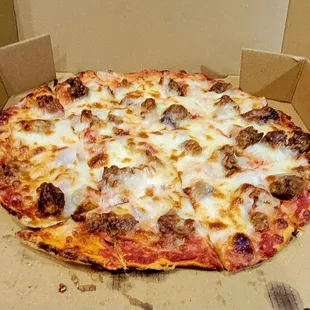 Thin crust sausage and onion pizza. Great!!!