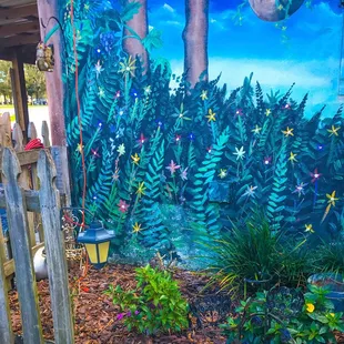 a mural of a garden