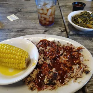 Lunch chopped pulled pork, corn and collard greens.