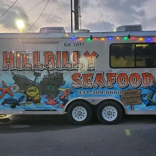 a food truck parked in a parking lot