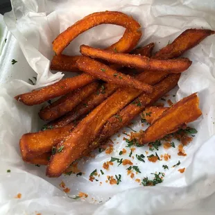 a basket of sweet potato fries