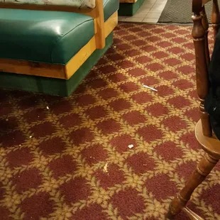 a row of lounge chairs in a waiting area