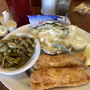 Fish and baked potato.