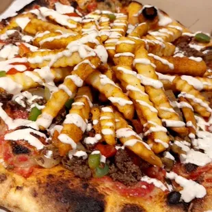 Paradise Hills- Steak Pizza with Mushroom, Onion, Green and Red Bell Peppers Topped off with Our White Sauce!