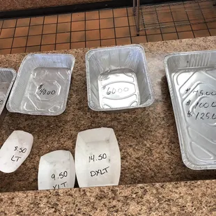 a variety of trays of food