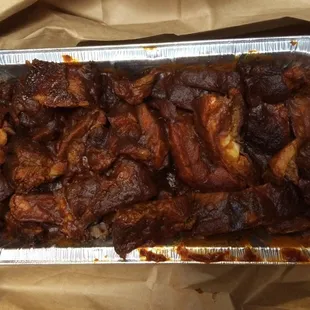 $25+tax, a very good deal for their rib tips.