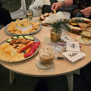 a table full of food and drinks