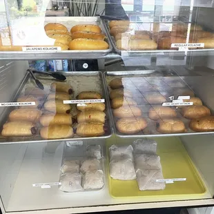 a display case full of doughnuts