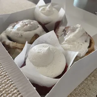 Cinnamon rolls and red velvet cupcakes