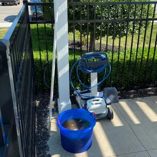There was a bucket of dirty liquid with no lid setting out for kids to play in or fall into. And also a bucket of pool chemicals, I assume.