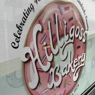 a pink donut with sprinkles