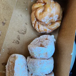 Powdered fluffy frosting filled and a peanut butter roll