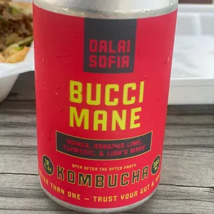 a can of beer on a table