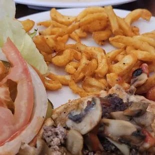Burger and curly fries, huge portions! Quick service and tasty!