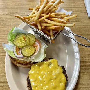 a burger and fries on a plate