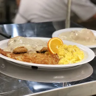 Hills Country Kitchen's chicken fried steak with the side of biscuits and gravy!