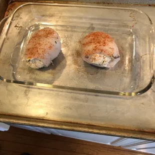 Uncooked stuffed flounder.  We seasoned it.